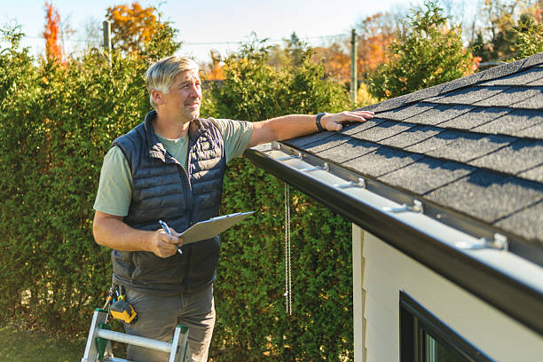 Professional Hail Damage Roof Repair technician working in Beverly, OH